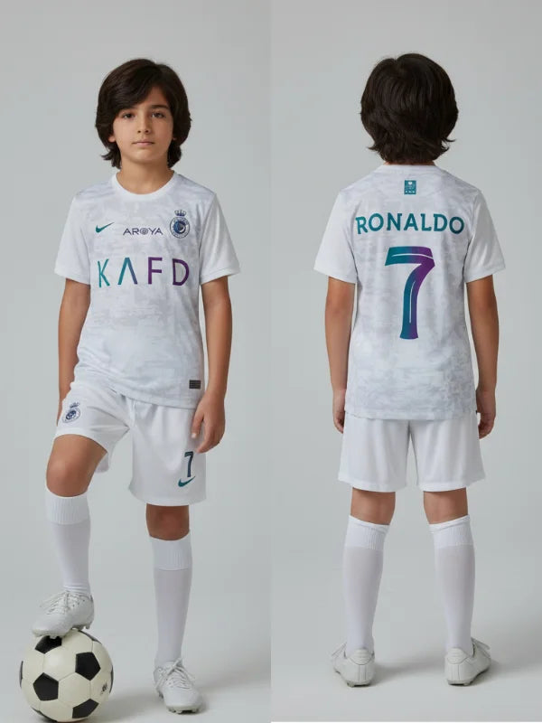 Child wearing a sports jersey with 'RONALDO' and number '7', Alnasser KAFD