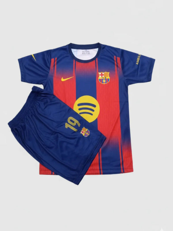 Blue and red sports kit of Lamine Yamal with yellow logo on a white background