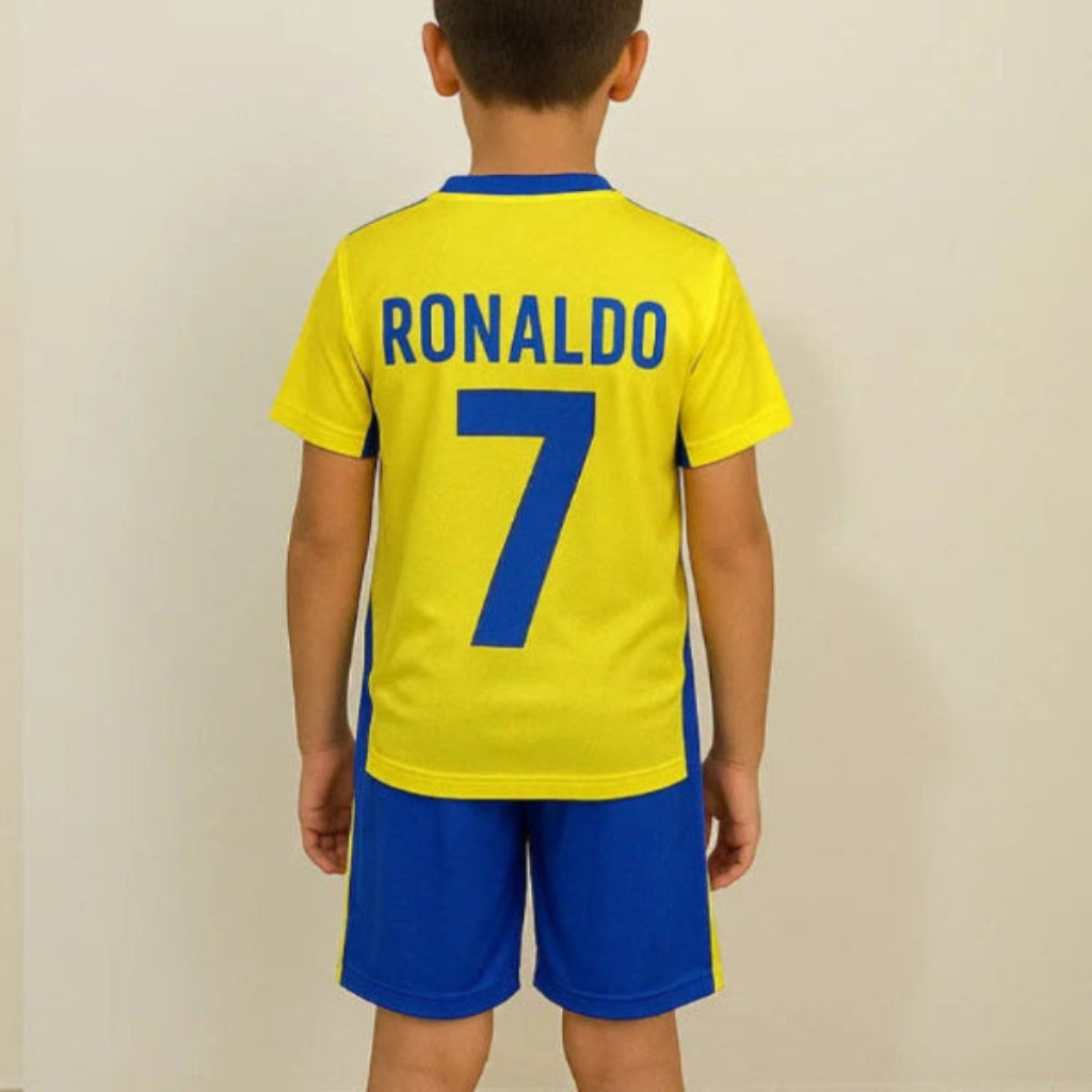 Child wearing a yellow sports jersey with 'RONALDO' and number '7' on the back, against a plain background.