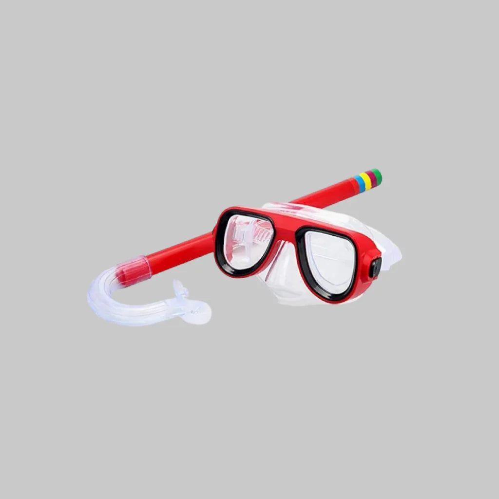 Red diving mask with a snorkel on a gray background