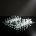 Glass chess set on a black background