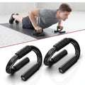 Person using exercise rings on a mat with close-up of the rings below.