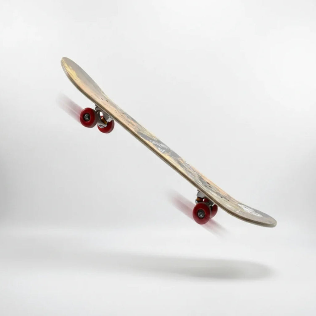 Skateboard with red wheels on a white background