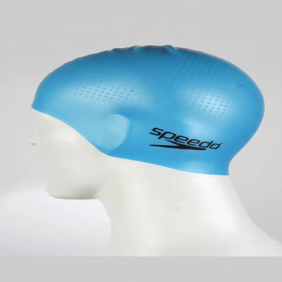 Blue swim cap with Speedo logo on a mannequin head against a gray background