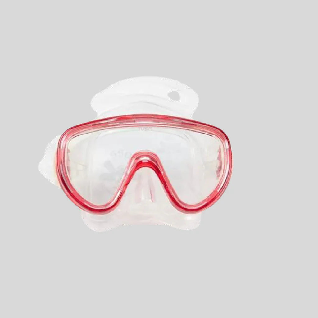 Red and clear diving mask on a gray background
