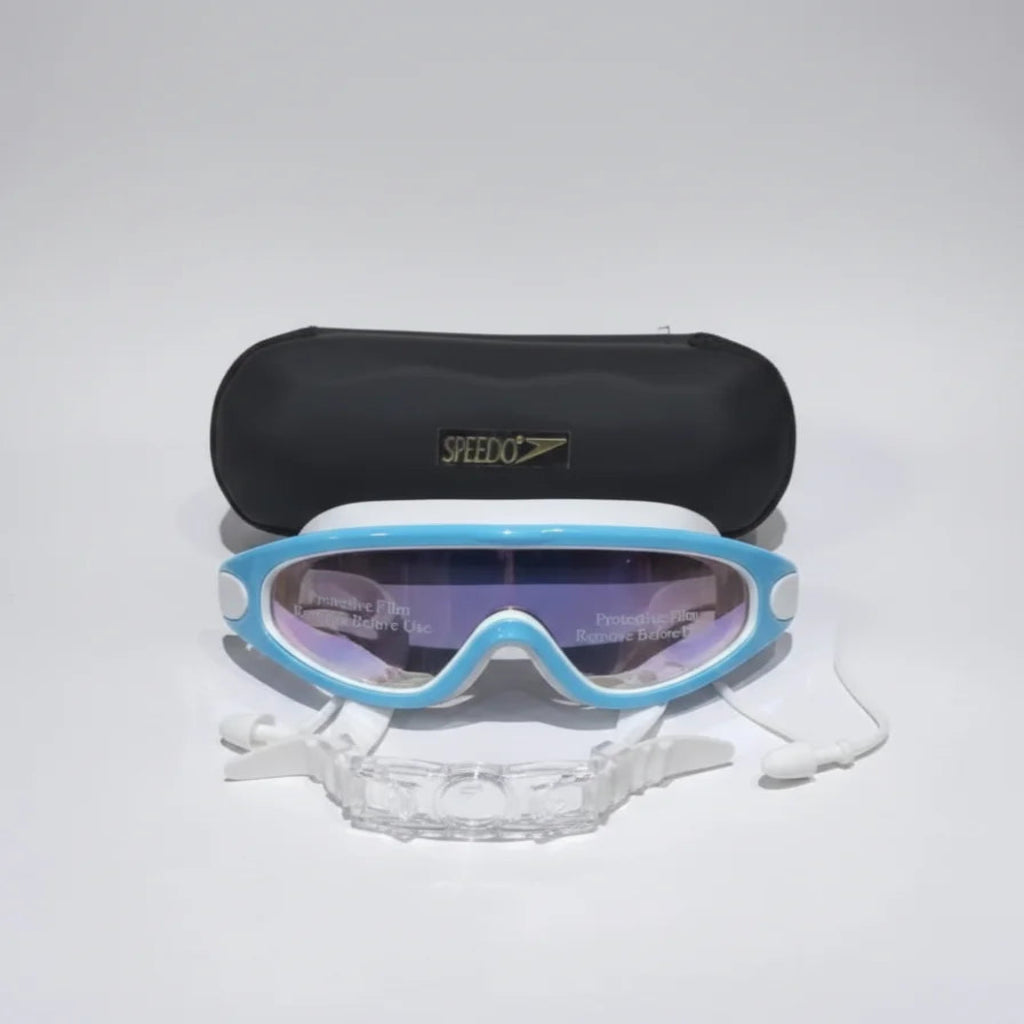 Swim goggles with blue frame and clear lens on a white background